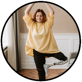 Woman with amputated leg in yoga pose